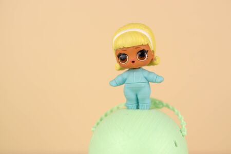KHARKOV, UKRAINE - JANUARY 15, 2020: Colorful plastic LOL doll and toys container on table. LOL Surprise series toys manufactured by MGA Entertainment inc.のeditorial素材