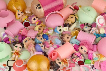 KHARKOV, UKRAINE - JANUARY 15, 2020: Many colorful plastic LOL dolls on table. LOL Surprise series toys manufactured by MGA Entertainment inc.のeditorial素材