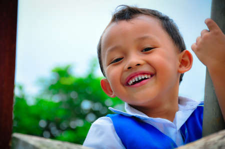 the big smile from the child when he playingのeditorial素材