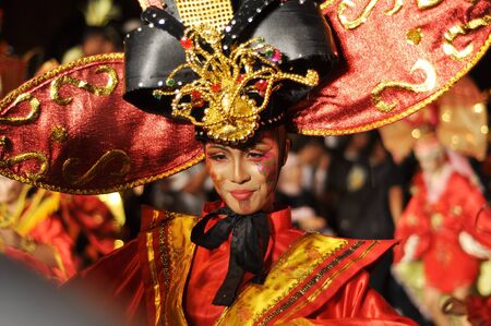 SEMARANG, INDONESIA - APRIL 30 2011. Dancer using an ethnic costume at the first Semarang Night Carnival event in Semarang, Indonesia. This event will be held again in April 2012 and can be one of the agenda for a trip to Southeast Asia and enjoy the cultのeditorial素材