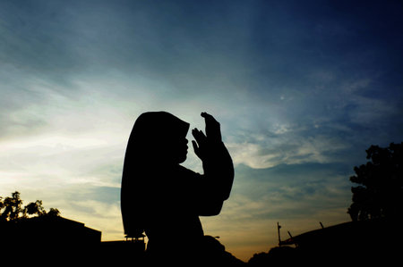 raised his hand to doaの写真素材