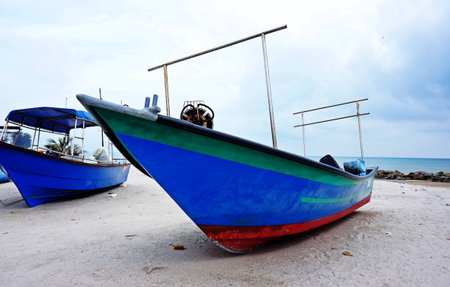 fishing boat on the beachの写真素材