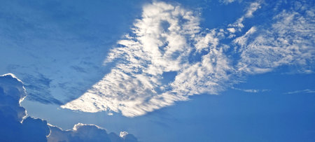 Clouds in the blue skybe used as a backgroundの写真素材