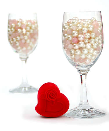  two glass cups of artificially pearls and stones  の写真素材