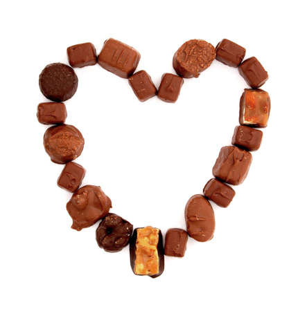 chocolate candies are ordered in heart shapeの写真素材