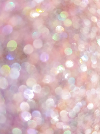 Multicolored abstract bokeh lights. Blurred shiny background