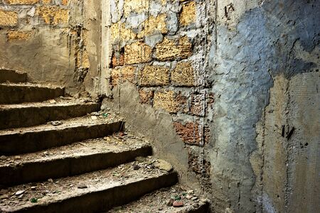 old dirty staircase in abandoned building close up.の写真素材
