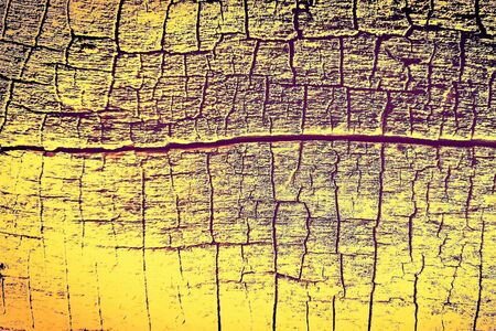 Yellow brown abstract background with cracks