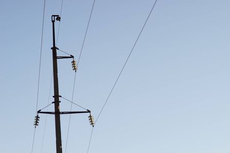 One power line in the blue sky.の写真素材