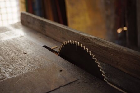 Metal dish of eletrical saw machine in the old tableの写真素材