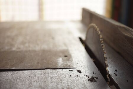 Closeup metal dish electric saw in iron tableの写真素材