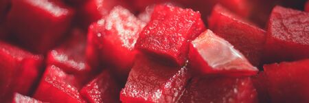 Square raw beetroot slices background. Healthy vegan food.の写真素材