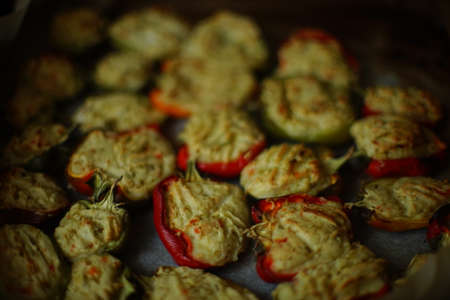 slices of pepper in half with mashed potatoes and carrots filling after bake in oven