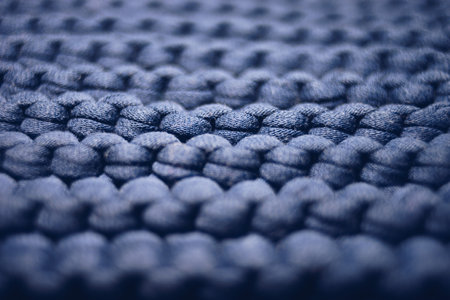 blue background large knitted thread pattern.
