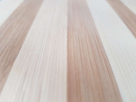 Striped dark and light brown wooden background.の写真素材