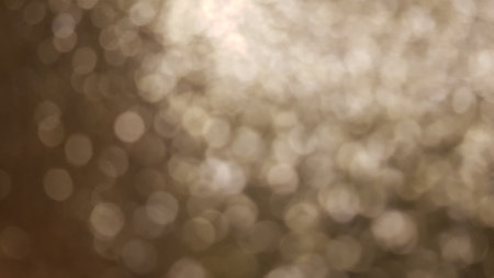 Golden brown background of shiny circles, rich abstraction.の写真素材