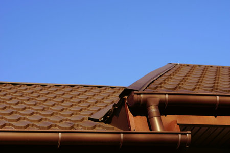 brown tiled roof in blue sky on a sunny day.の写真素材