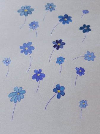 Cute floral pattern wit blue flowers on beige paper.の写真素材