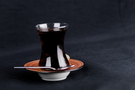 a cup of tea lit by artificial lightの写真素材