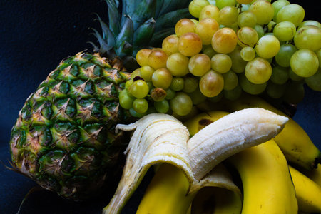 Delicious fruits with wonderful colors, taken under artificial lightの写真素材