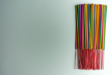 colorful joss stick on white backgroundの写真素材