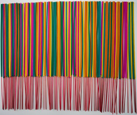 colorful joss stick on white backgroundの写真素材