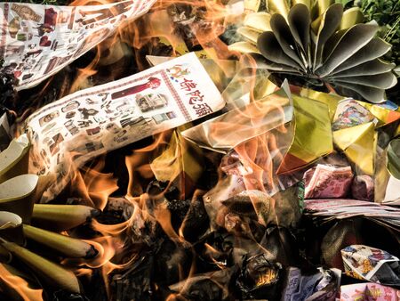 burning silver-gold paper , is believe of chineseの写真素材