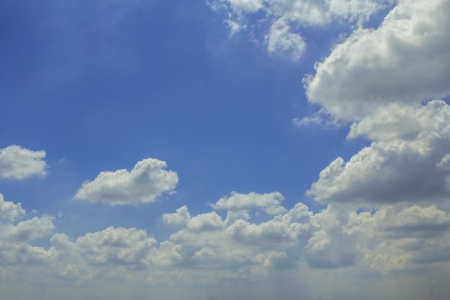 Blue sky and rain clouds began forming before the rain.の写真素材