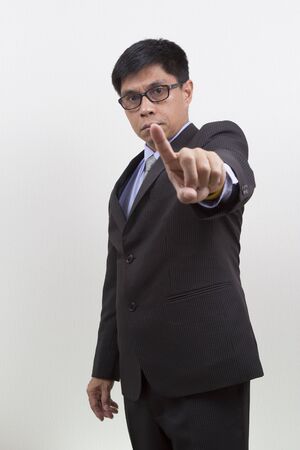 Businessman Gesturing Pointing on White
の写真素材
