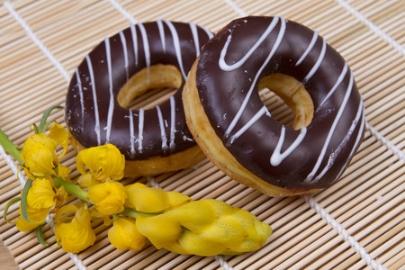 Donuts on wooden background.の写真素材