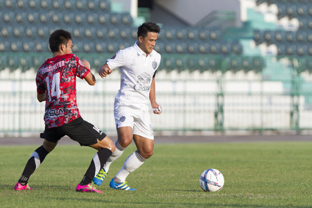 BANGKOK,THAILAND:APRIL;2016: Suchao Nutnum of Buriram during football Toyota League cup between Army FC and BURIRAM UTD. , at Army Stadium on April 10,2016:Thailand.のeditorial素材