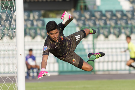 BANGKOK,THAILAND:APRIL;2016:Phusit khumsakun of Army FC during football Toyota League cup between Army FC and BURIRAM UTD. , at Army Stadium on April 10,2016:Thailand.のeditorial素材