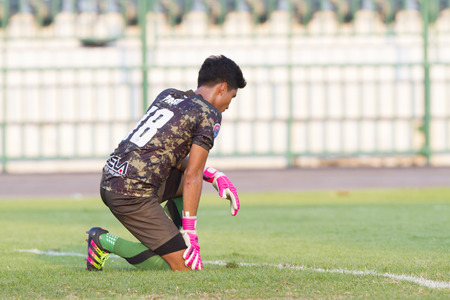 BANGKOK,THAILAND:APRIL;2016:Phusit khumsakun of Army FC during football Toyota League cup between Army FC and BURIRAM UTD. , at Army Stadium on April 10,2016:Thailand.のeditorial素材