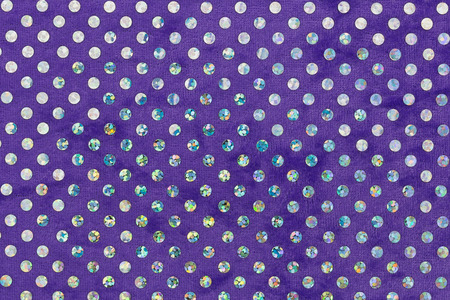 Purple fabric with brightly colored circles. Top viewの写真素材