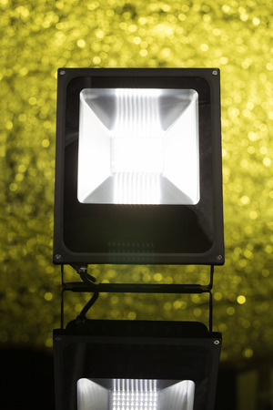 LED spotlight on background defocused. Front viewの写真素材