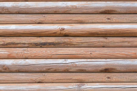 Texture of round wooden sticks. With a brown toneの写真素材