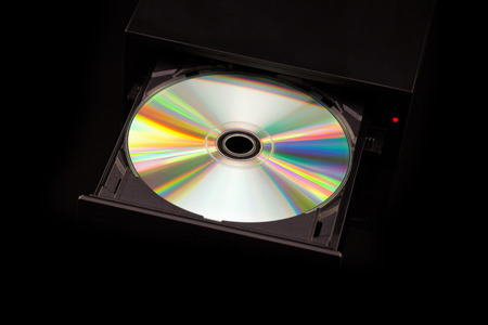 DVD / CD burner on black background. Top viewの写真素材