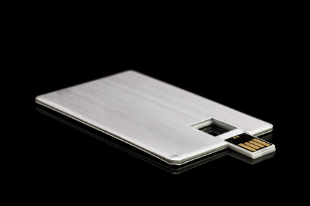 Credit card memory stick isolated on black background. Front viewの写真素材