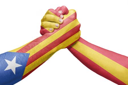Flags of Spain and the catalonia throwing a wrestling arm. Isolated white backgroundの写真素材