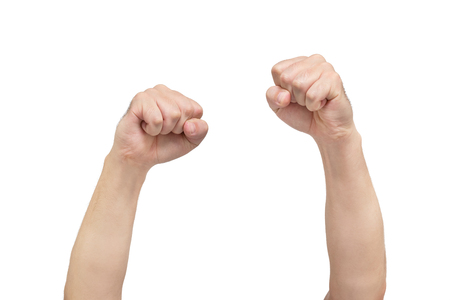 Two hands of fists on white background, symbol of protest. Front viewの写真素材