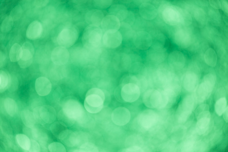 Abstract defocused green background. Blurred circlesの写真素材