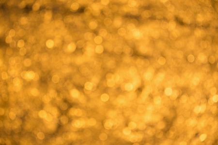 Abstract defocused orange background. Blurred circlesの写真素材