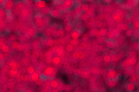 Abstract defocused red background. Blurred circlesの写真素材