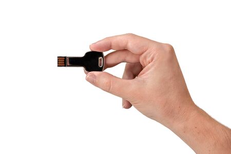 Key USB memory stick on hand with white background. front view