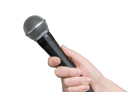 Interviewer or reporter with a close-up microphone in hand. White isolated backgroundの写真素材