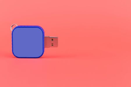 Blue USB memory stick on red background. Close-upの写真素材