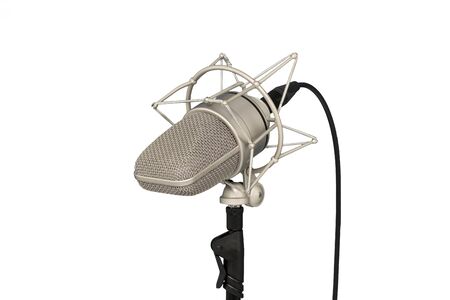 Mic - Close-up of a microphone stand. Professional condenser large-diaphragm. Isolated white backgroundの写真素材