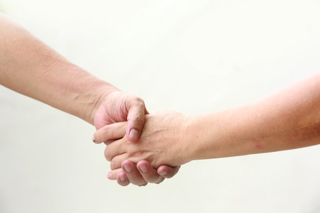 business man and woman shaking hands, isolated on white