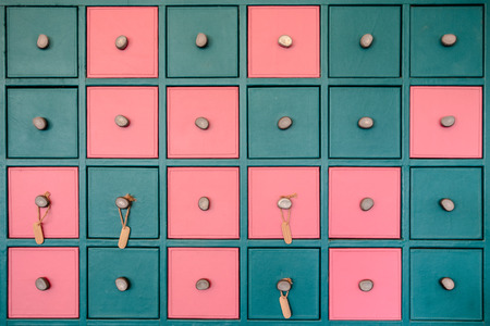Pastel colorful pattern of square drawers, pink and greenの写真素材