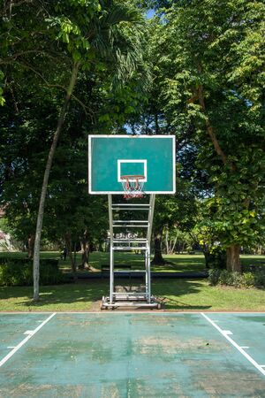 Green basketball backboard in the parkの写真素材